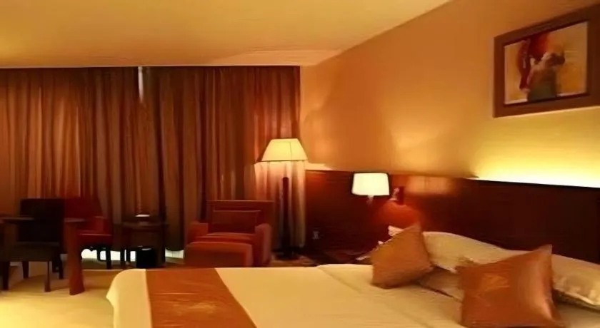 Bed in Fujian Galaxy Garden Hotel