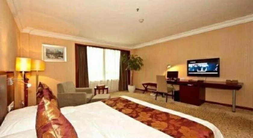 Bed in Fujian Galaxy Garden Hotel