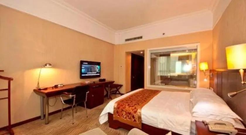 Bed in Fujian Galaxy Garden Hotel