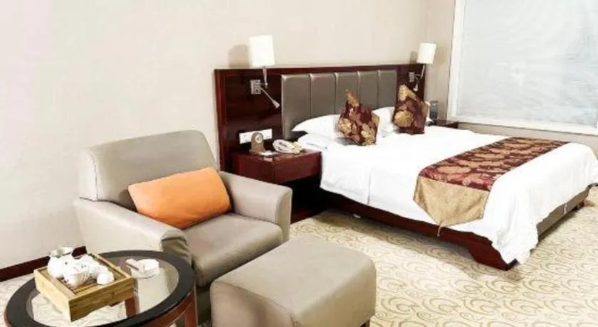 Bed in Fujian Galaxy Garden Hotel