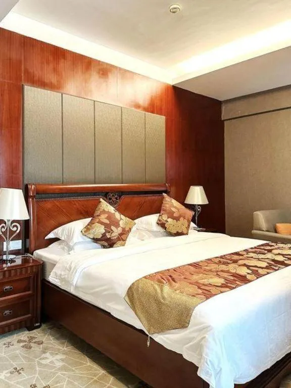 Bed in Fujian Galaxy Garden Hotel