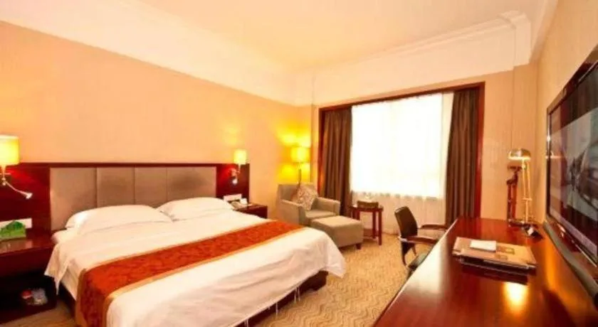 Bed in Fujian Galaxy Garden Hotel
