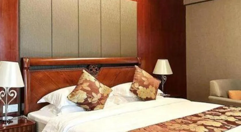 Bed in Fujian Galaxy Garden Hotel