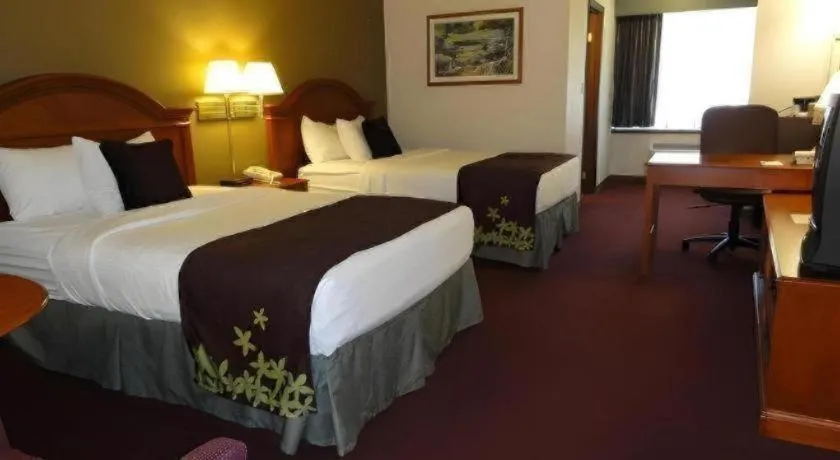 Bed in AmericInn by Wyndham La Crosse Riverfront-Conference Center