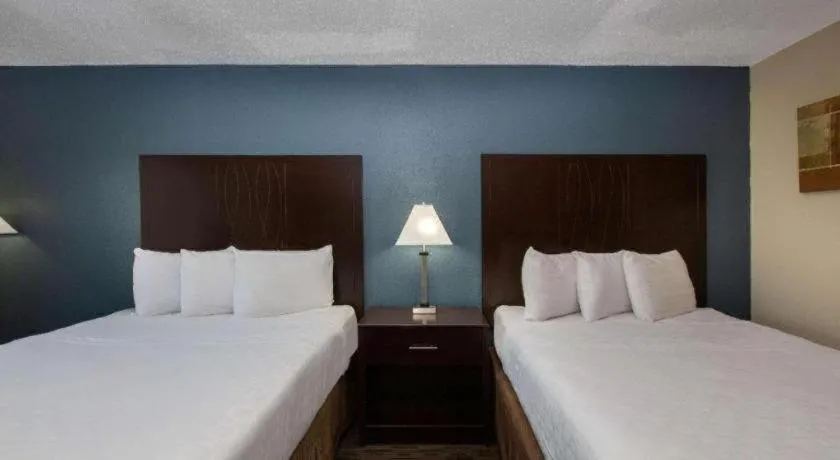 Bed in AmericInn by Wyndham La Crosse Riverfront-Conference Center