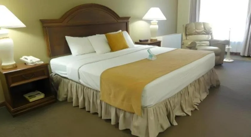 Bed in AmericInn by Wyndham La Crosse Riverfront-Conference Center