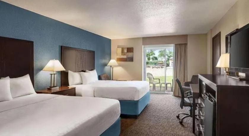 Bed in AmericInn by Wyndham La Crosse Riverfront-Conference Center