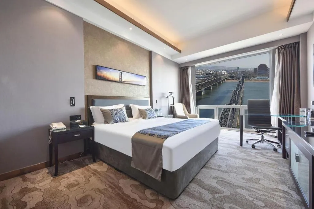 Bed in Dandong Rising Zhonglian Hotel