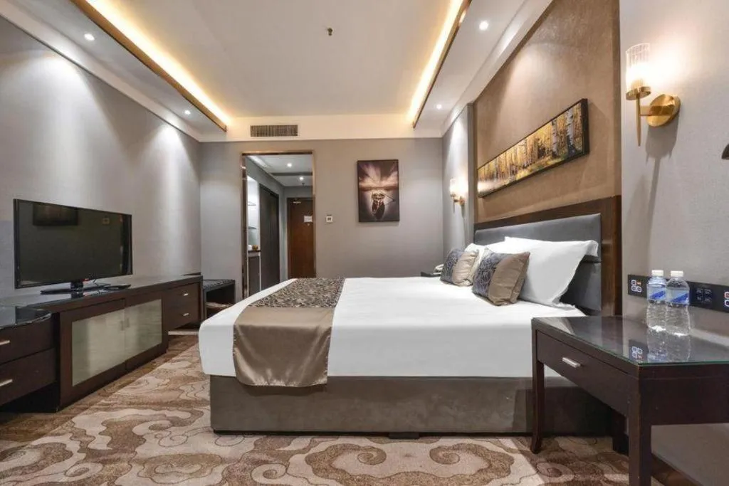 Bed in Dandong Rising Zhonglian Hotel
