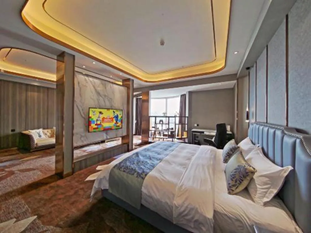 Bed in Dandong Rising Zhonglian Hotel