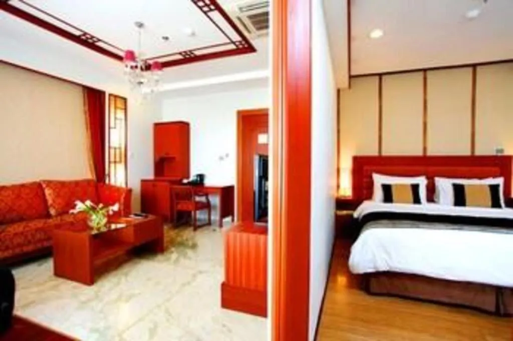 Bed in Amos Cozy Hotel Melawai