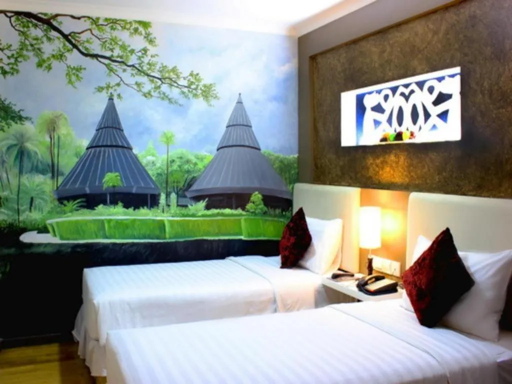 Bed in Amos Cozy Hotel Melawai