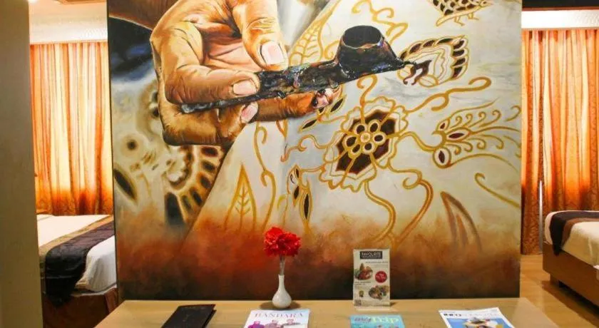 Bed in Amos Cozy Hotel Melawai