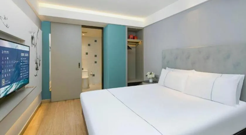 Bed in Magnotel Ningbo Tianyi Plaza Railway Station