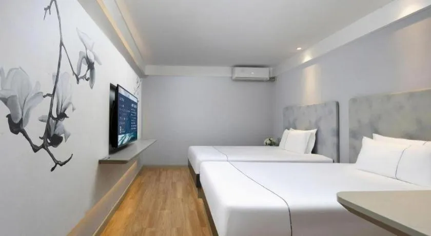 Bed in Magnotel Ningbo Tianyi Plaza Railway Station