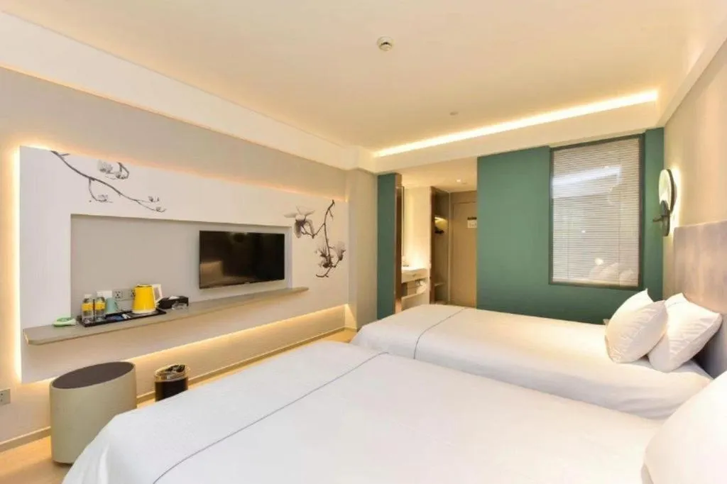 Bed in Magnotel Ningbo Tianyi Plaza Railway Station