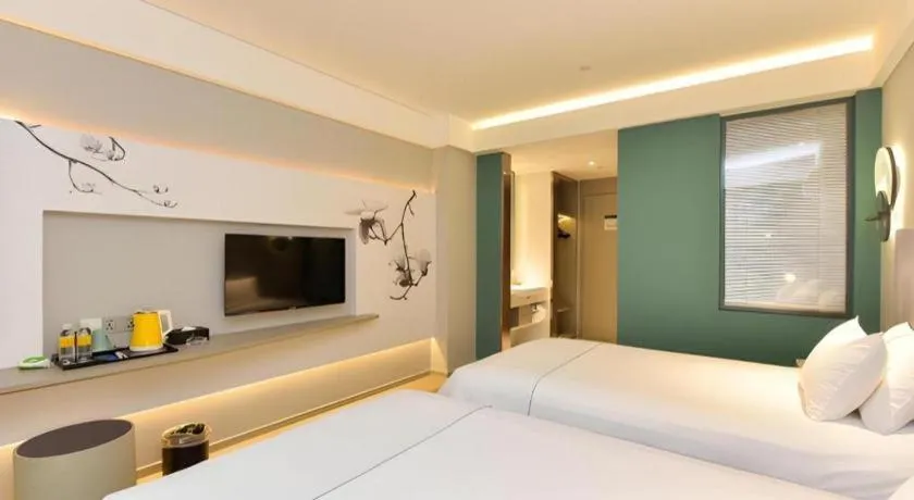 Bed in Magnotel Ningbo Tianyi Plaza Railway Station