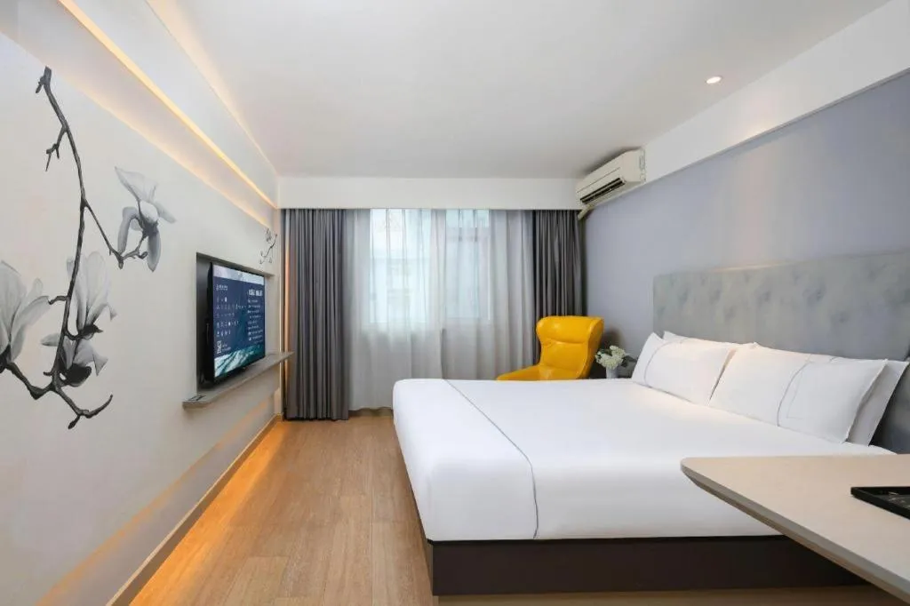 Bed in Magnotel Ningbo Tianyi Plaza Railway Station