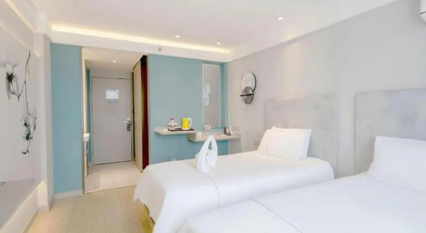 Bed in Magnotel Ningbo Tianyi Plaza Railway Station