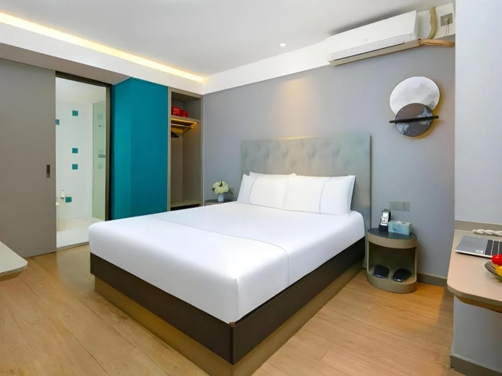 Bed in Magnotel Ningbo Tianyi Plaza Railway Station