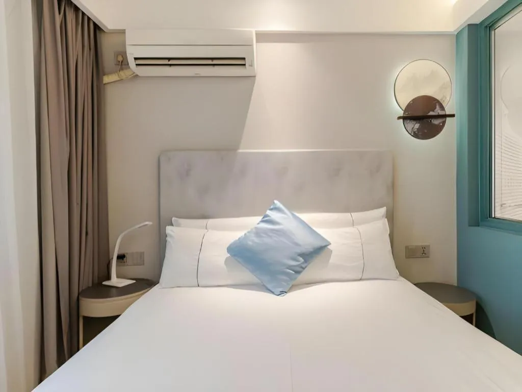 Bed in Magnotel Ningbo Tianyi Plaza Railway Station