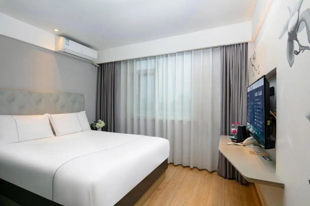 Bed in Magnotel Ningbo Tianyi Plaza Railway Station