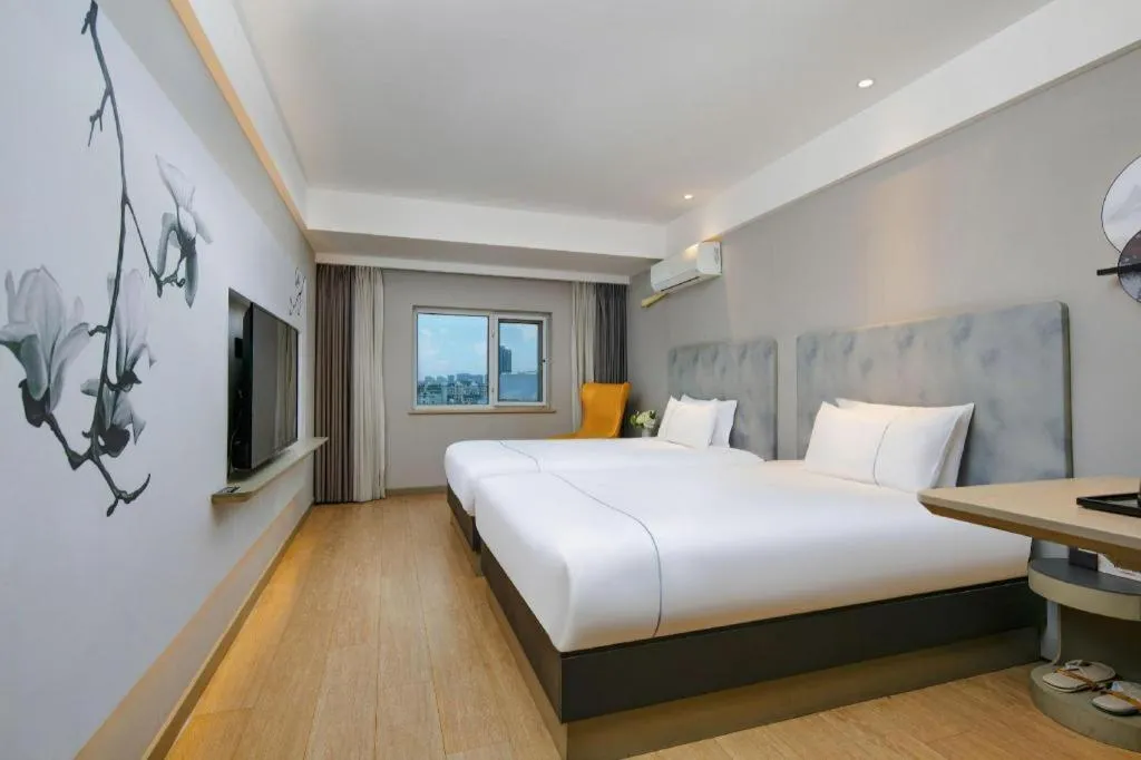 Bed in Magnotel Ningbo Tianyi Plaza Railway Station