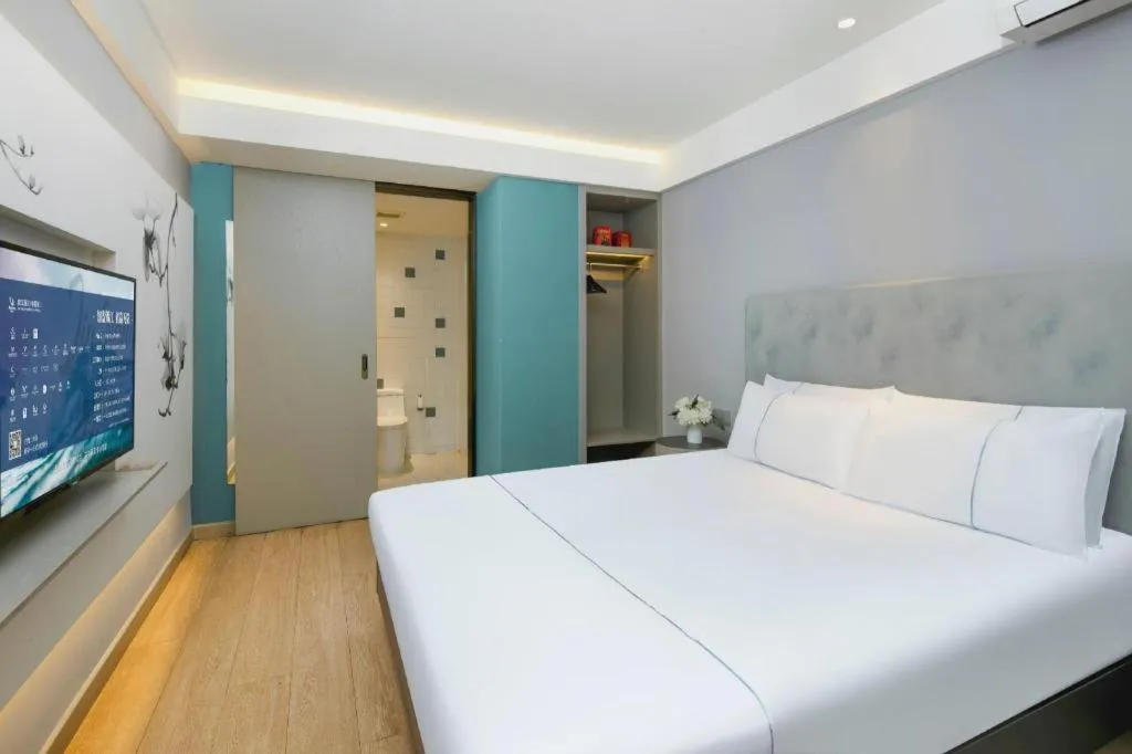 Bed in Magnotel Ningbo Tianyi Plaza Railway Station