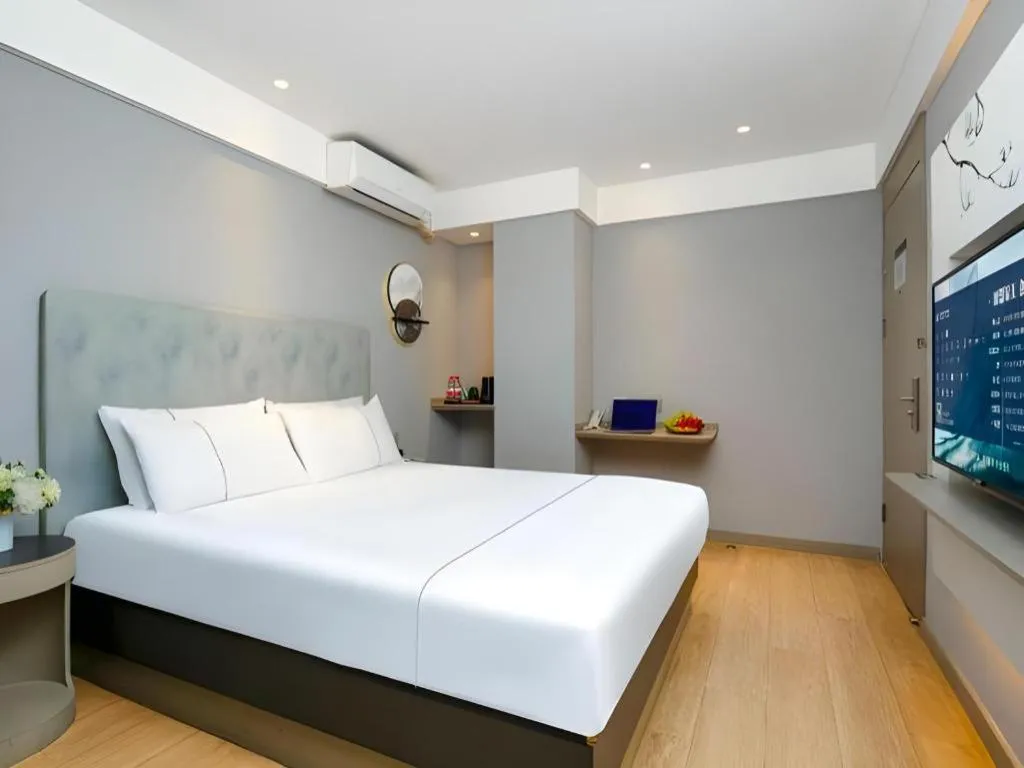 Bed in Magnotel Ningbo Tianyi Plaza Railway Station