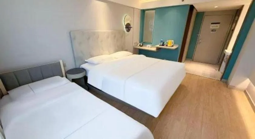 Bed in Magnotel Ningbo Tianyi Plaza Railway Station