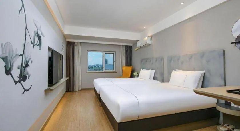 Bed in Magnotel Ningbo Tianyi Plaza Railway Station