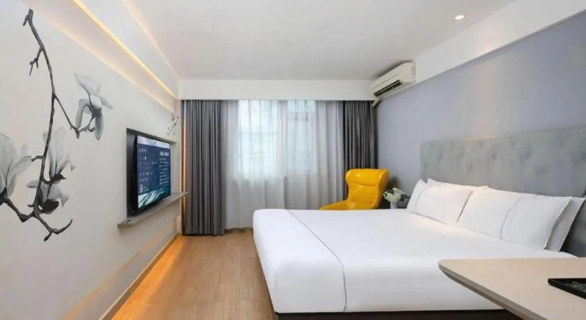 Bed in Magnotel Ningbo Tianyi Plaza Railway Station