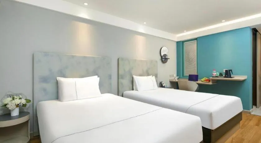 Bed in Magnotel Ningbo Tianyi Plaza Railway Station