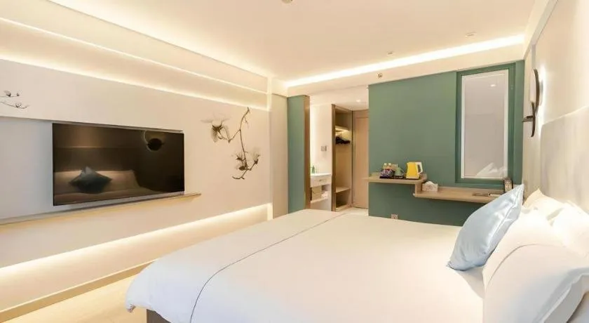 Bed in Magnotel Ningbo Tianyi Plaza Railway Station