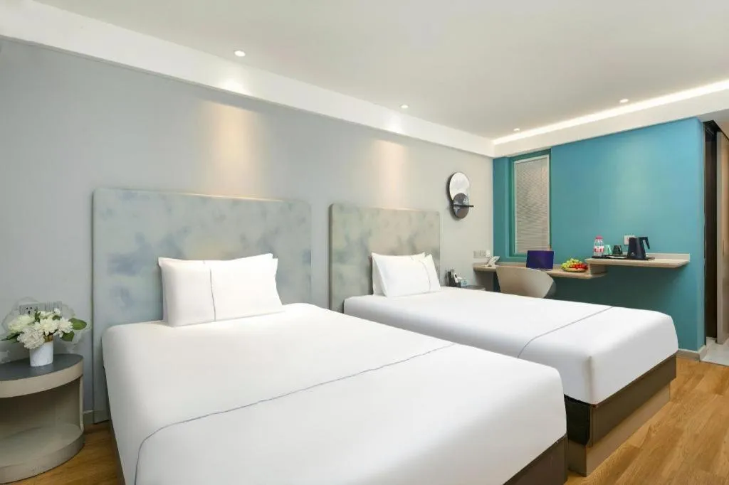 Bed in Magnotel Ningbo Tianyi Plaza Railway Station