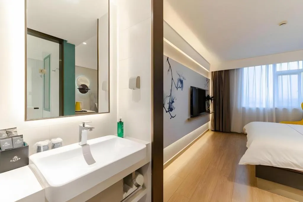 Bed in Magnotel Ningbo Tianyi Plaza Railway Station