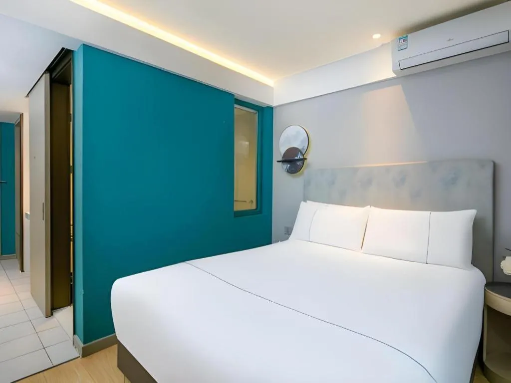 Bed in Magnotel Ningbo Tianyi Plaza Railway Station