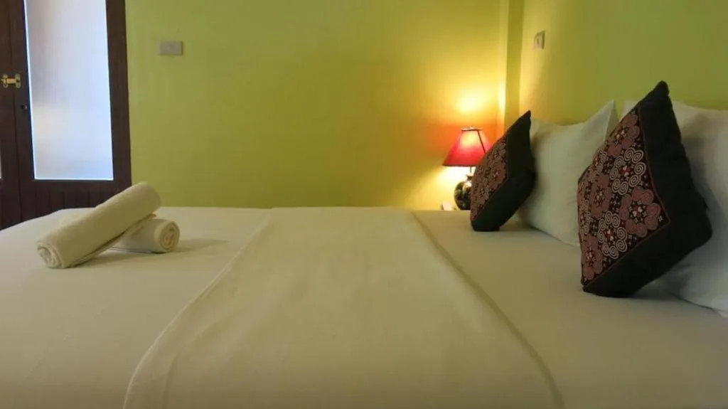 Bed in Baan Lapoon Hotel