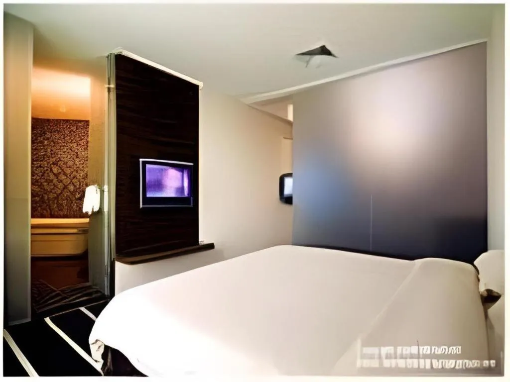 Bed in Orient Sunseed Hotel Airport Branch