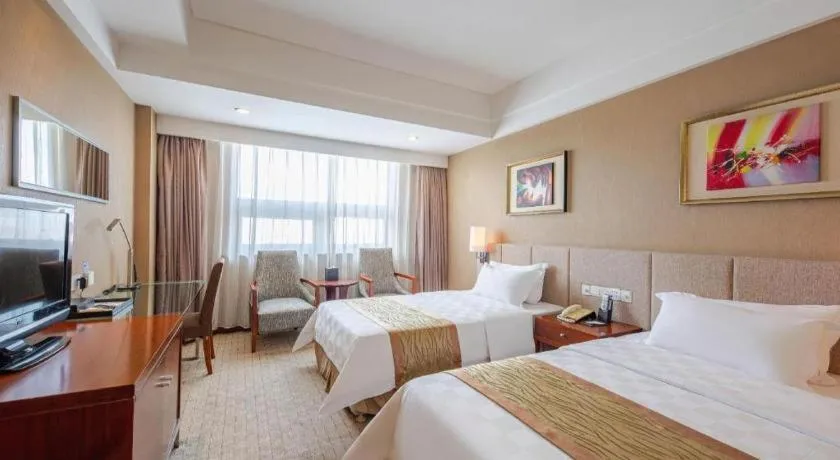 Bed in Jinan Blue Horizon Hotel Shizhong