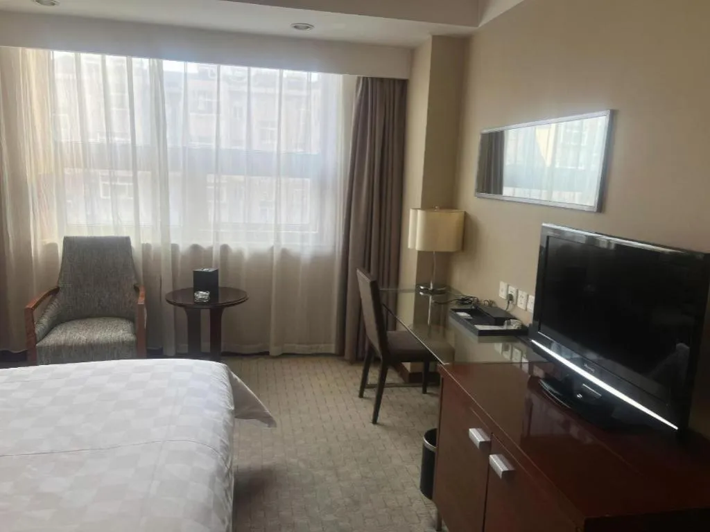 Bed in Jinan Blue Horizon Hotel Shizhong