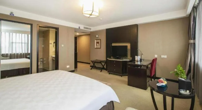 Bed in Zibo Blue Horizon International Hotel