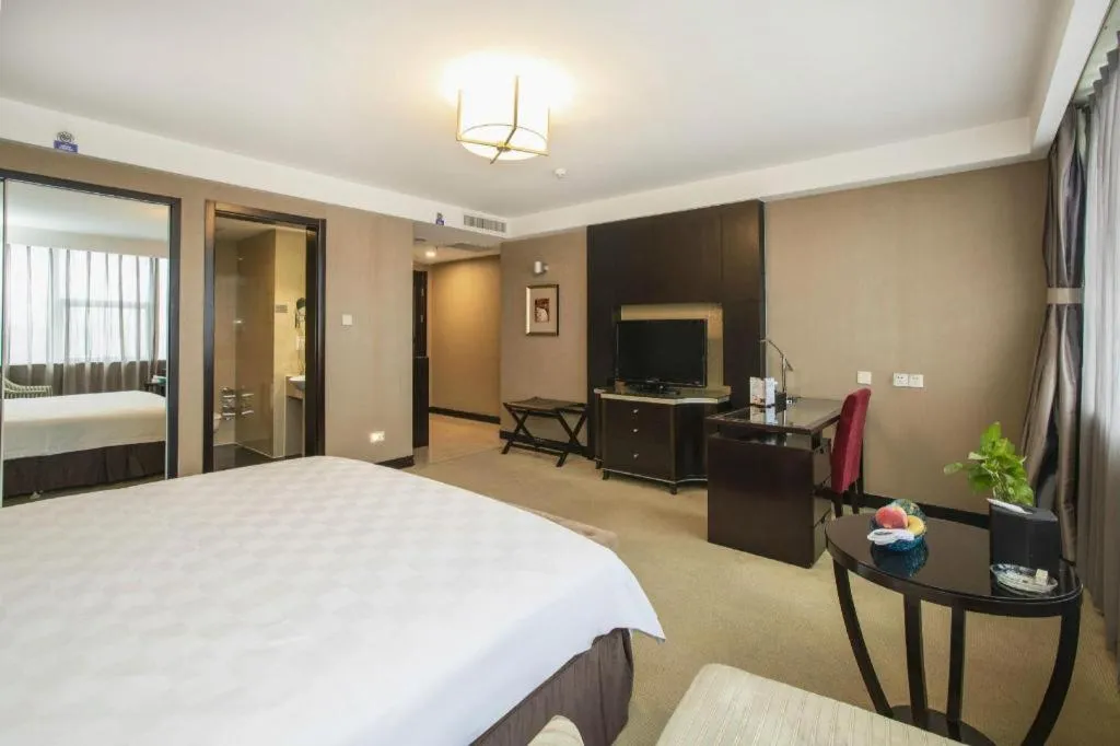 Bed in Zibo Blue Horizon International Hotel