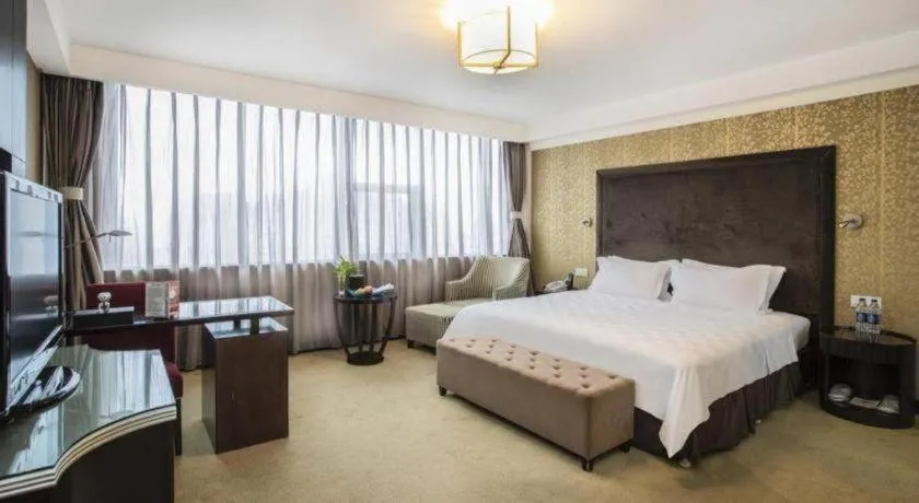 Bed in Zibo Blue Horizon International Hotel