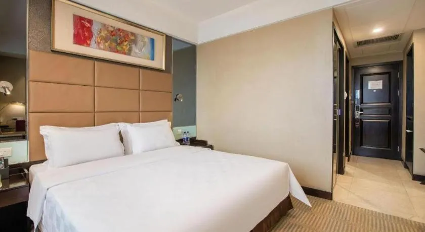 Bed in Zibo Blue Horizon International Hotel