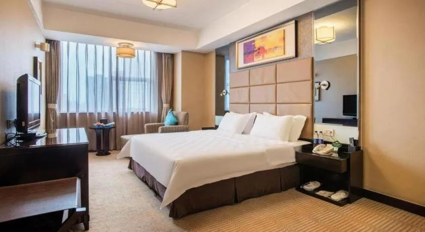 Bed in Zibo Blue Horizon International Hotel