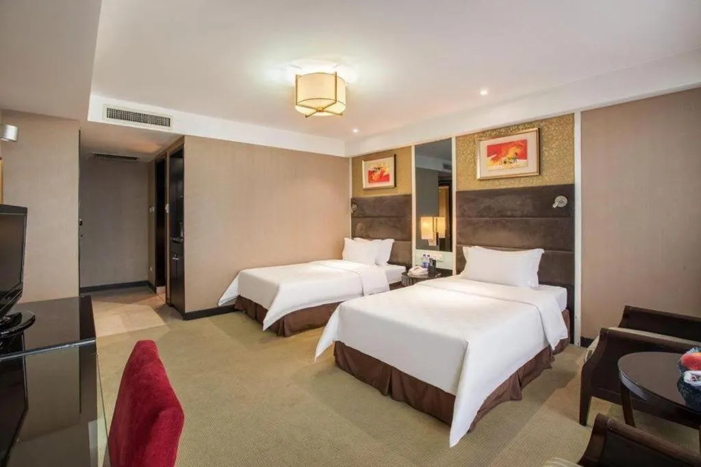 Bed in Zibo Blue Horizon International Hotel