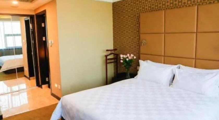 Bed in Zibo Blue Horizon International Hotel