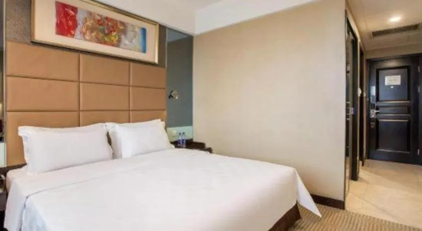 Bed in Zibo Blue Horizon International Hotel
