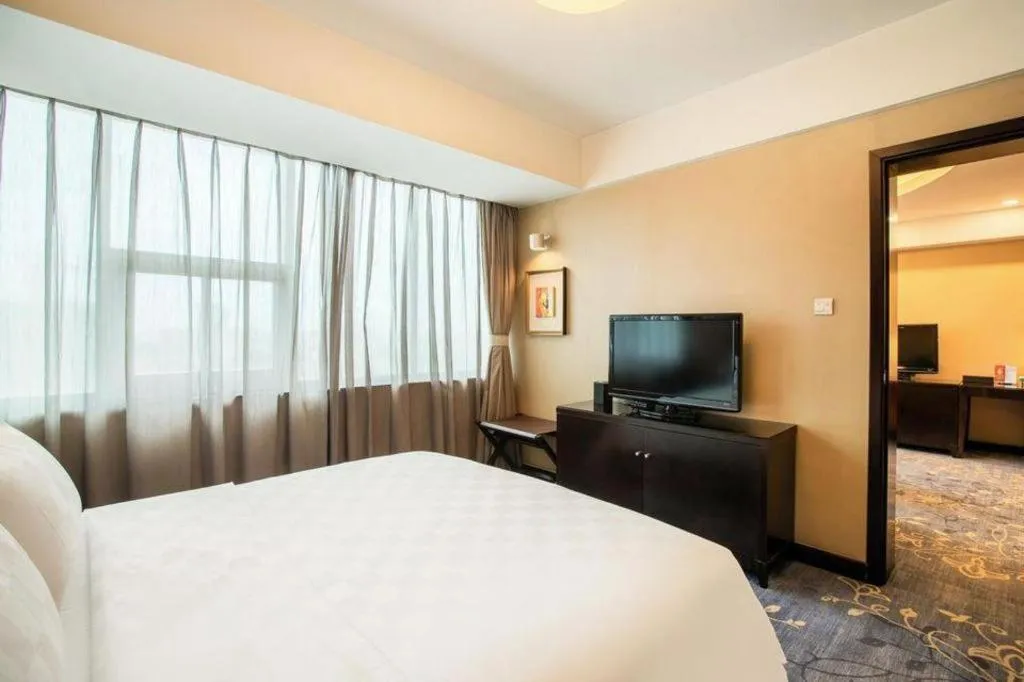 Bed in Zibo Blue Horizon International Hotel